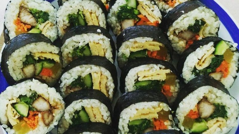 A plate of freshly rolled and sliced kimbap